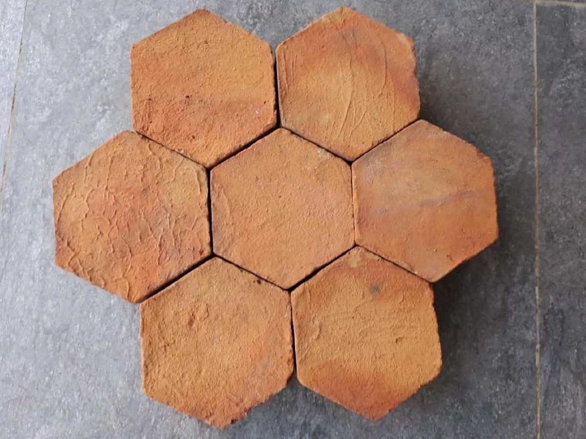 A group of hexagon shaped bricks

Description automatically generated